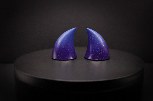 Back view of imp devil horns in a royal purple to periwinkle ombré with a glittery finish.