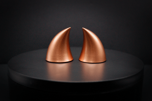 Back view of imp devil horns in metallic copper.