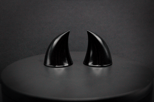 Back view of imp devil horns in black with a glossy finish.