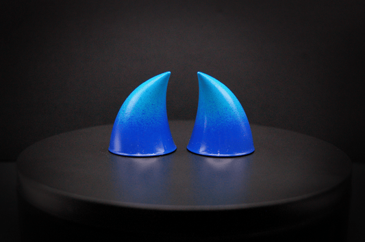 Back view of imp devil horns in a royal blue to sky blue ombré with a glossy finish.