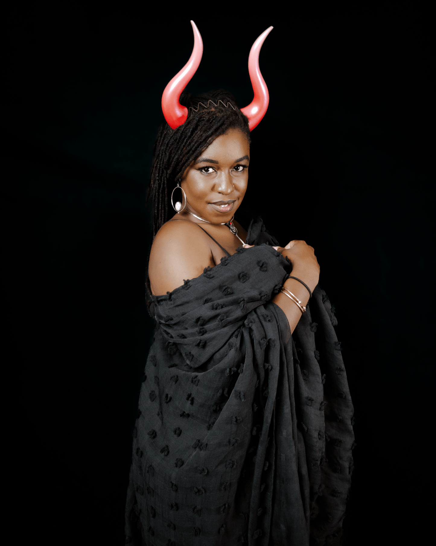 Kitty McSparkles wears Haus of Brimstone Rapture Ombré succubus horns and a black wrap. Pic by Synthetic Studio.