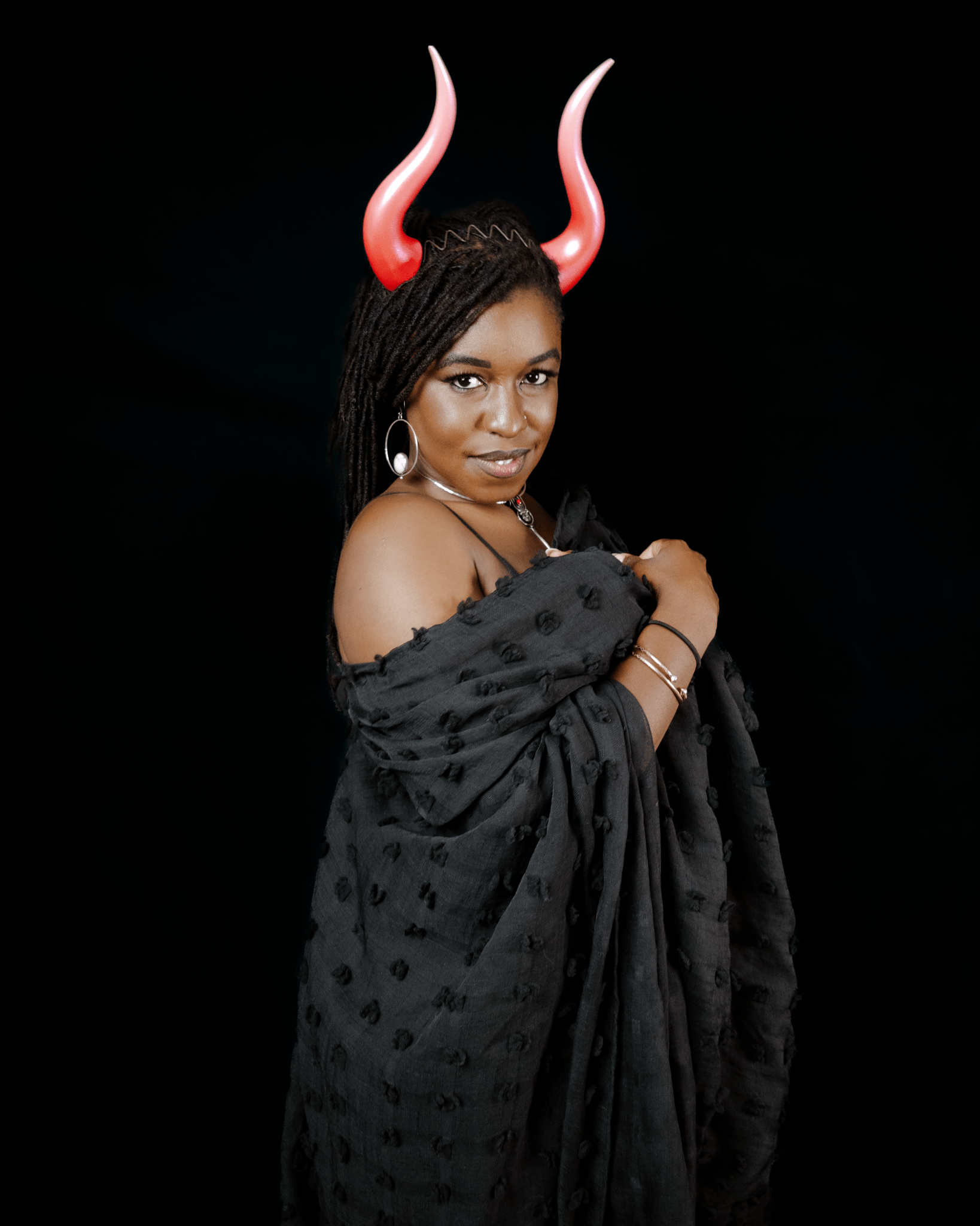 Kitty McSparkles wears Haus of Brimstone Rapture Ombré succubus horns and a black wrap. Pic by Synthetic Studio.