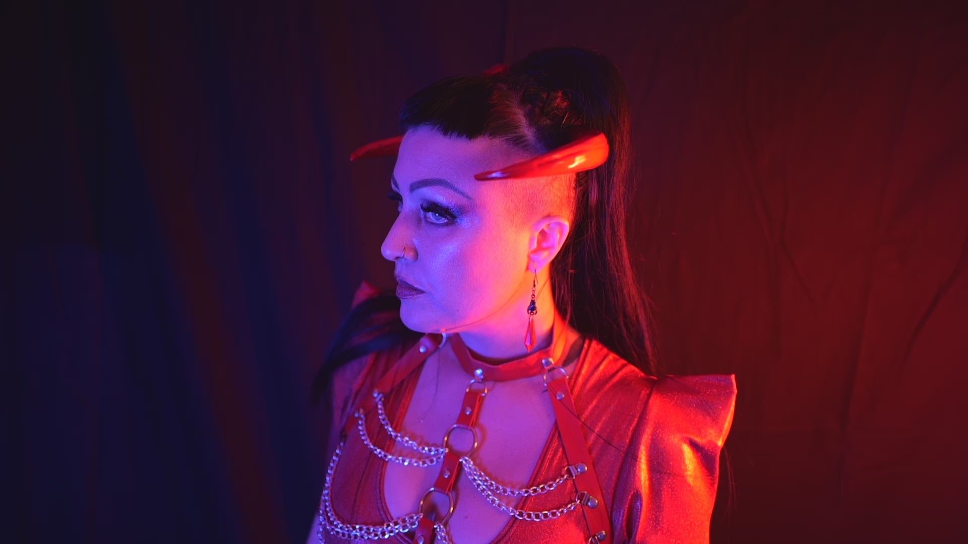 Load video: Zoe Sol models Haus of Brimstone Azazel Horns in a video by Optic Onslaught. 