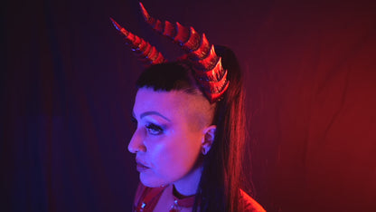 Zoe Sol models Haus of Brimstone Tiefling Horns in a video by Optic Onslaught. 