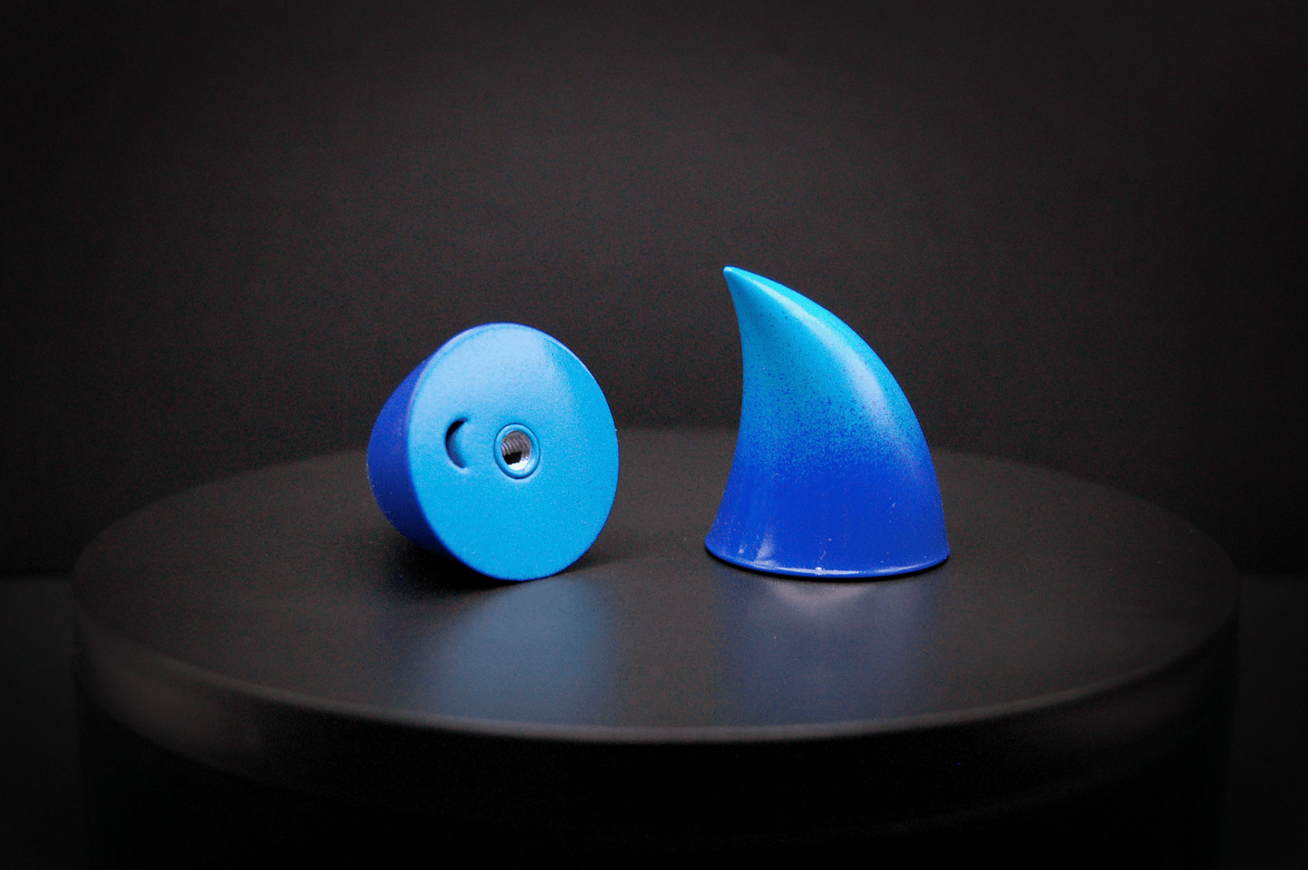 Bottom view of imp devil horns in a royal blue to sky blue ombré with a glossy finish, showing a threaded insert on the base.