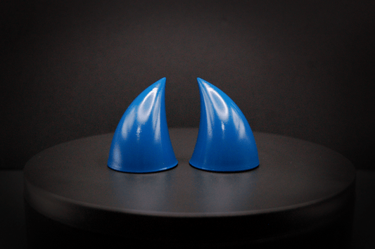 Front view of imp devil horns in storm blue, a deep blue with a glossy finish.